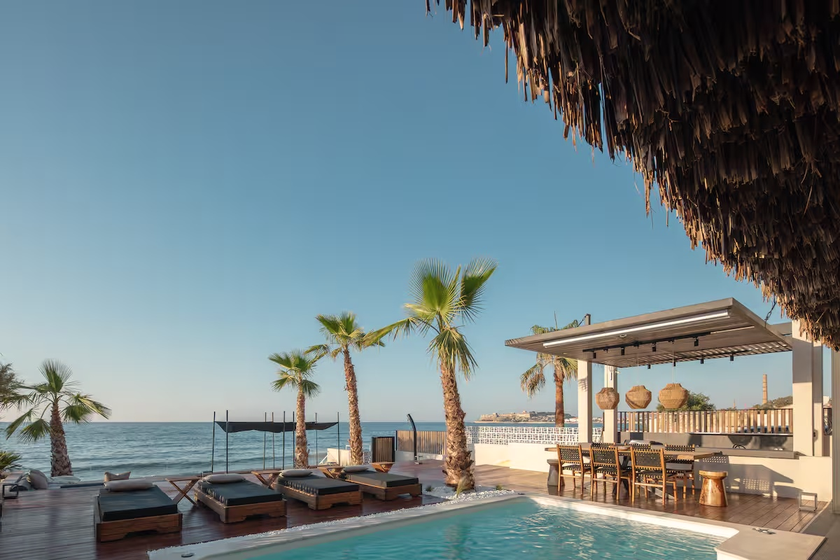 Pool terrace and pergola overlooking the sea at Casa Negro